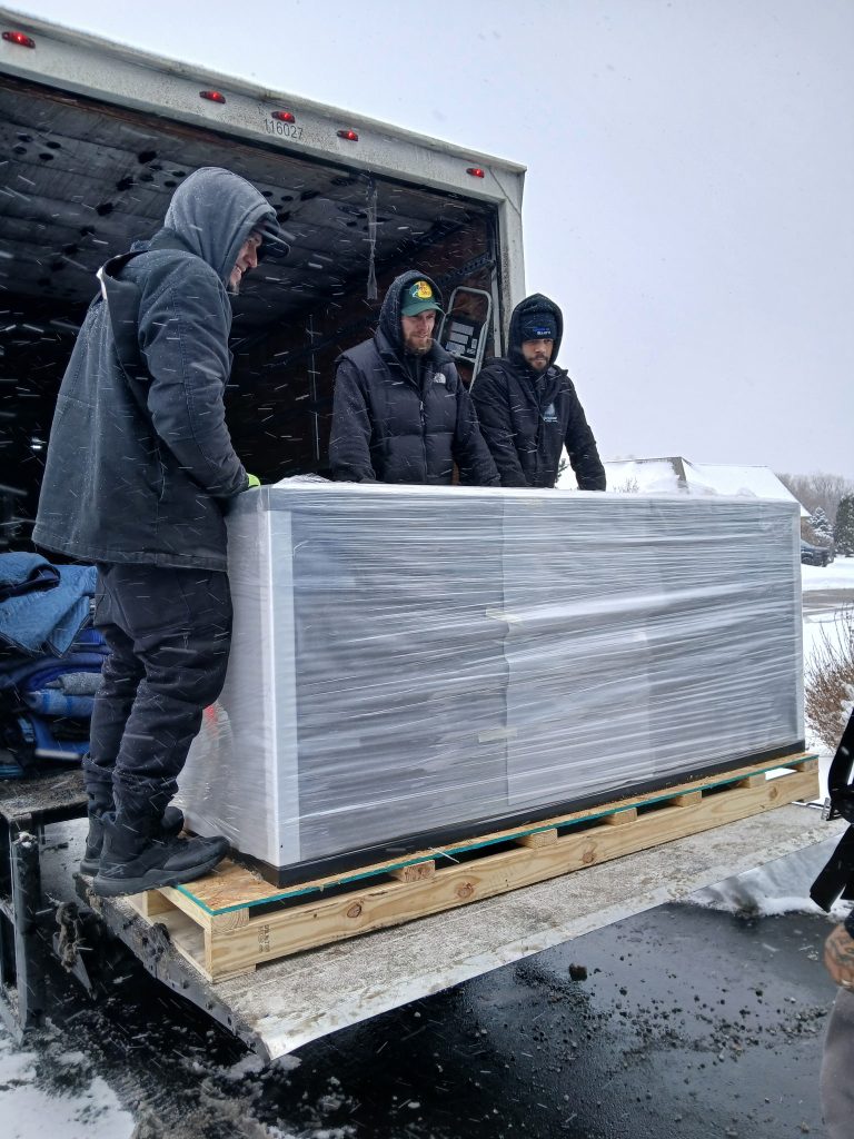 Fish tank moving with Reliable Movers 8 men. Liverpool NY. 12-8-2025